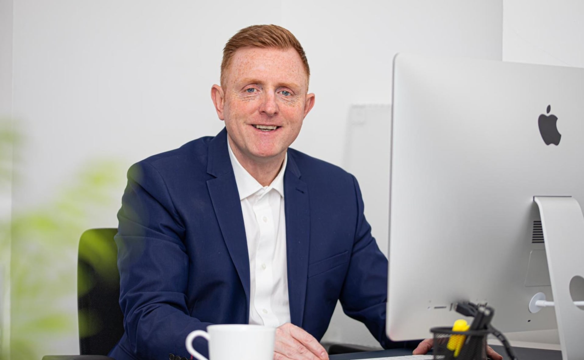 man at computer doing s corp estate planning