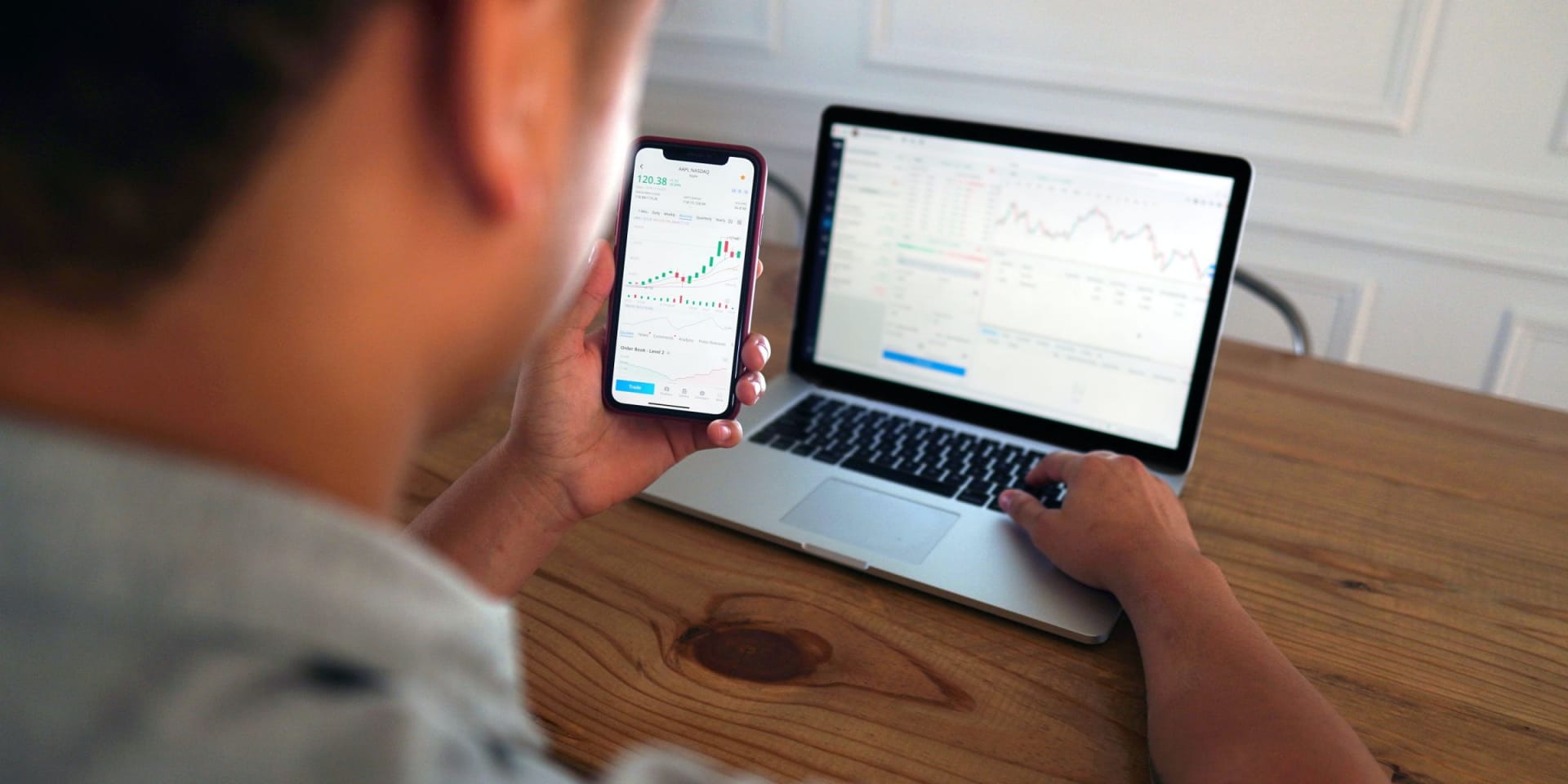 man with stocks researching Wealth Protection