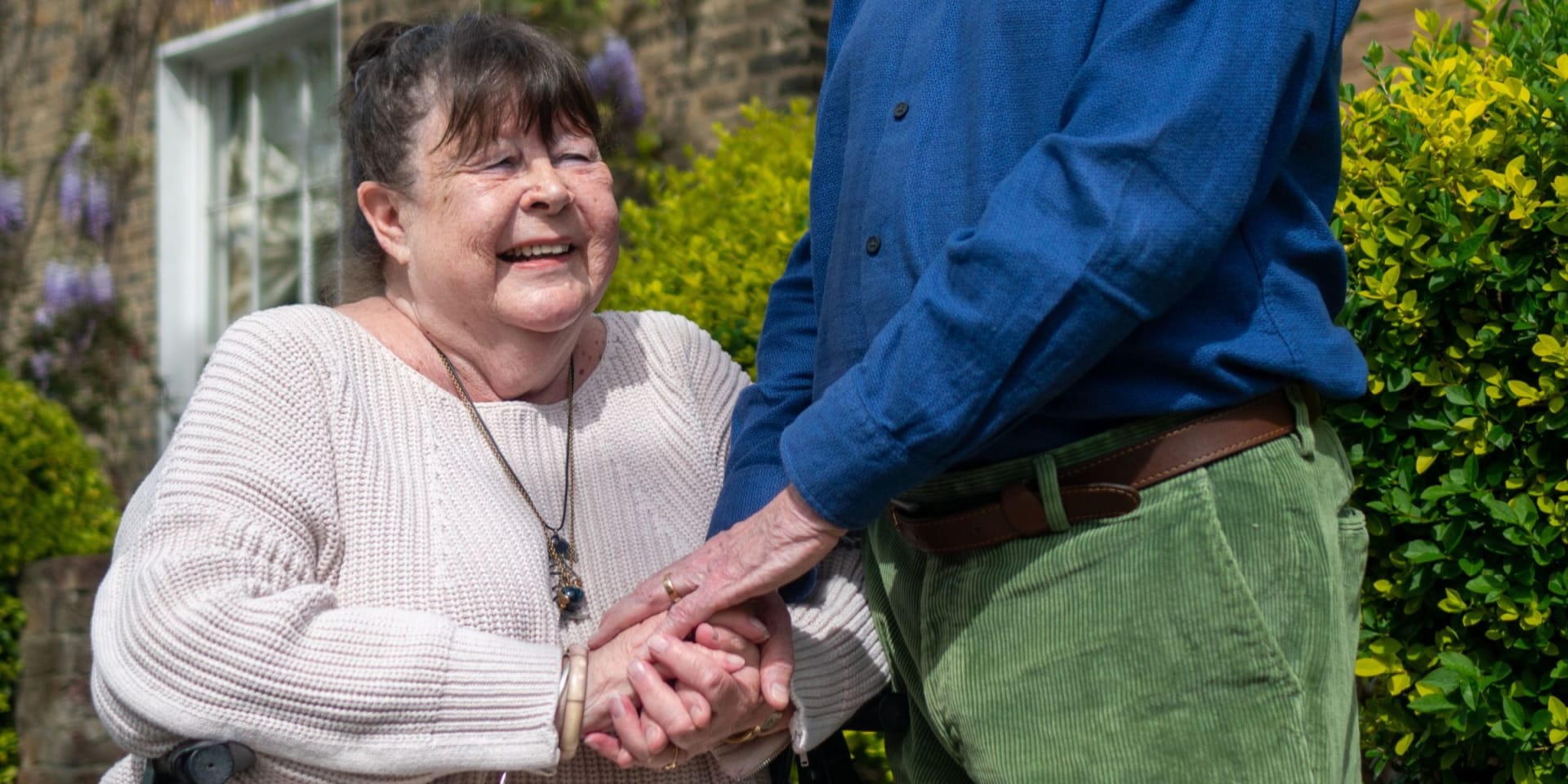 Woman in wheel chair talkng about Spend Down Medicaid Strategy